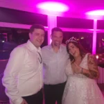 Bride and guests celebrating at a Queenston Heights wedding with uplighting by Icon Events.