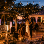 Outdoor summer wedding reception in Ontario featuring elegant string lighting, a bride and groom's first dance, and a luxury outdoor reception at sunset.