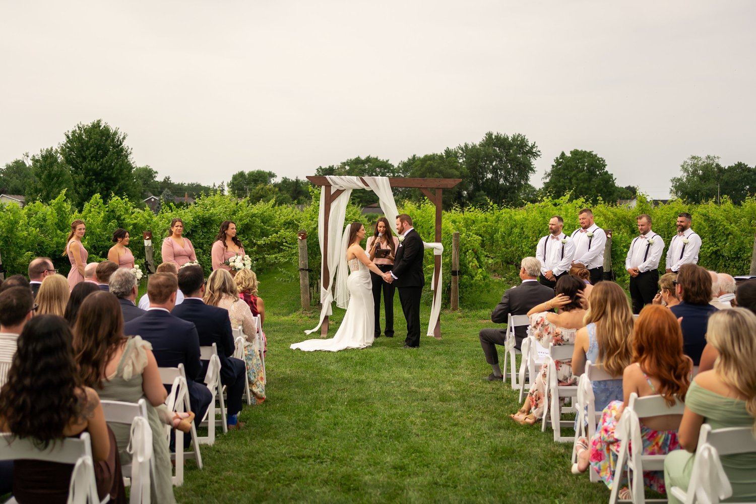 Outdoor vineyard wedding ceremony at 180 Estate Winery