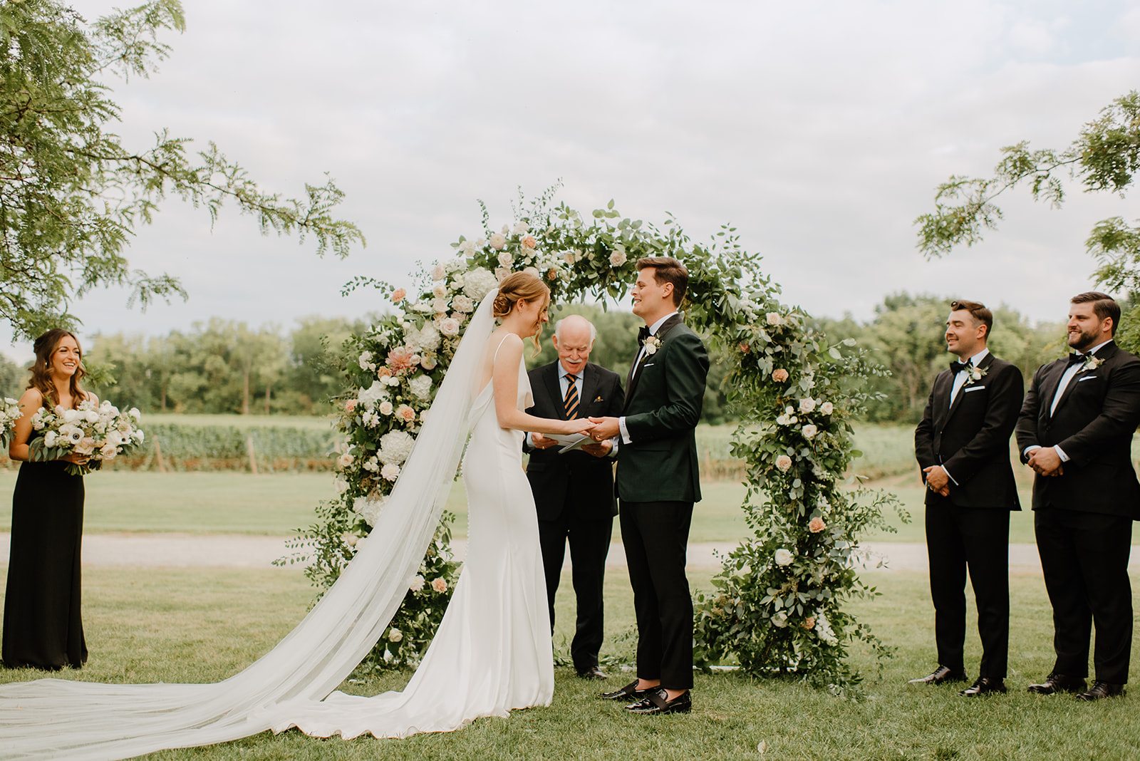 Outdoor vineyard wedding ceremony at Château des Charmes in Niagara-on-the-Lake