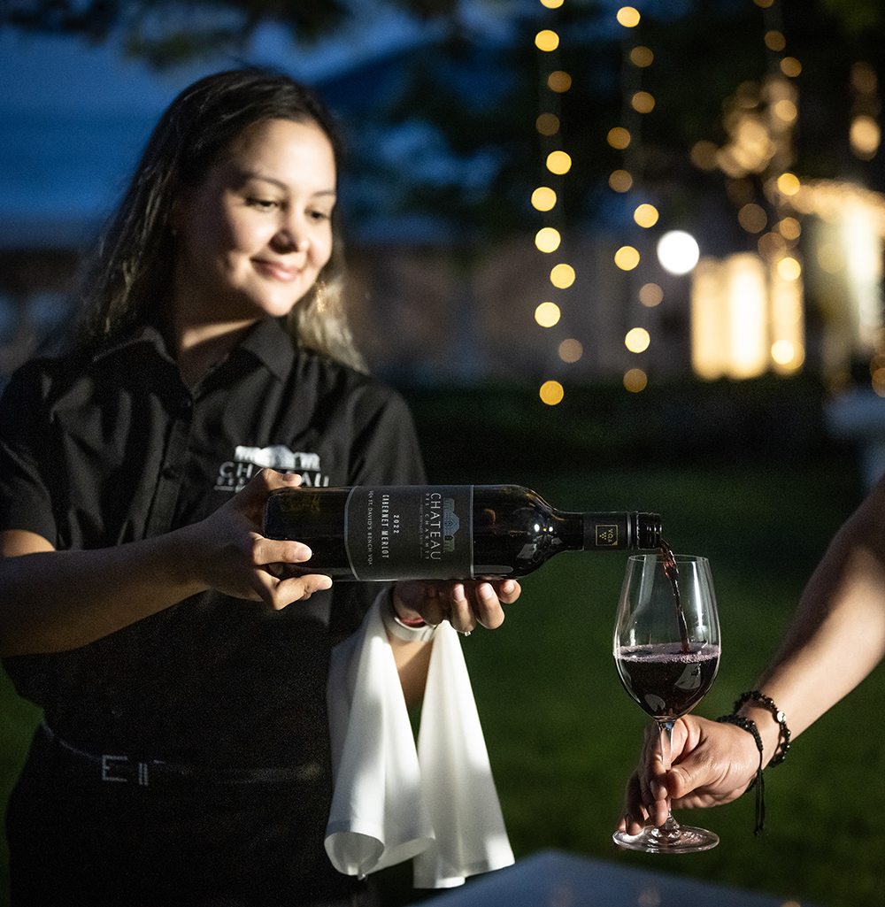 Château des Charmes estate wine being poured for guests