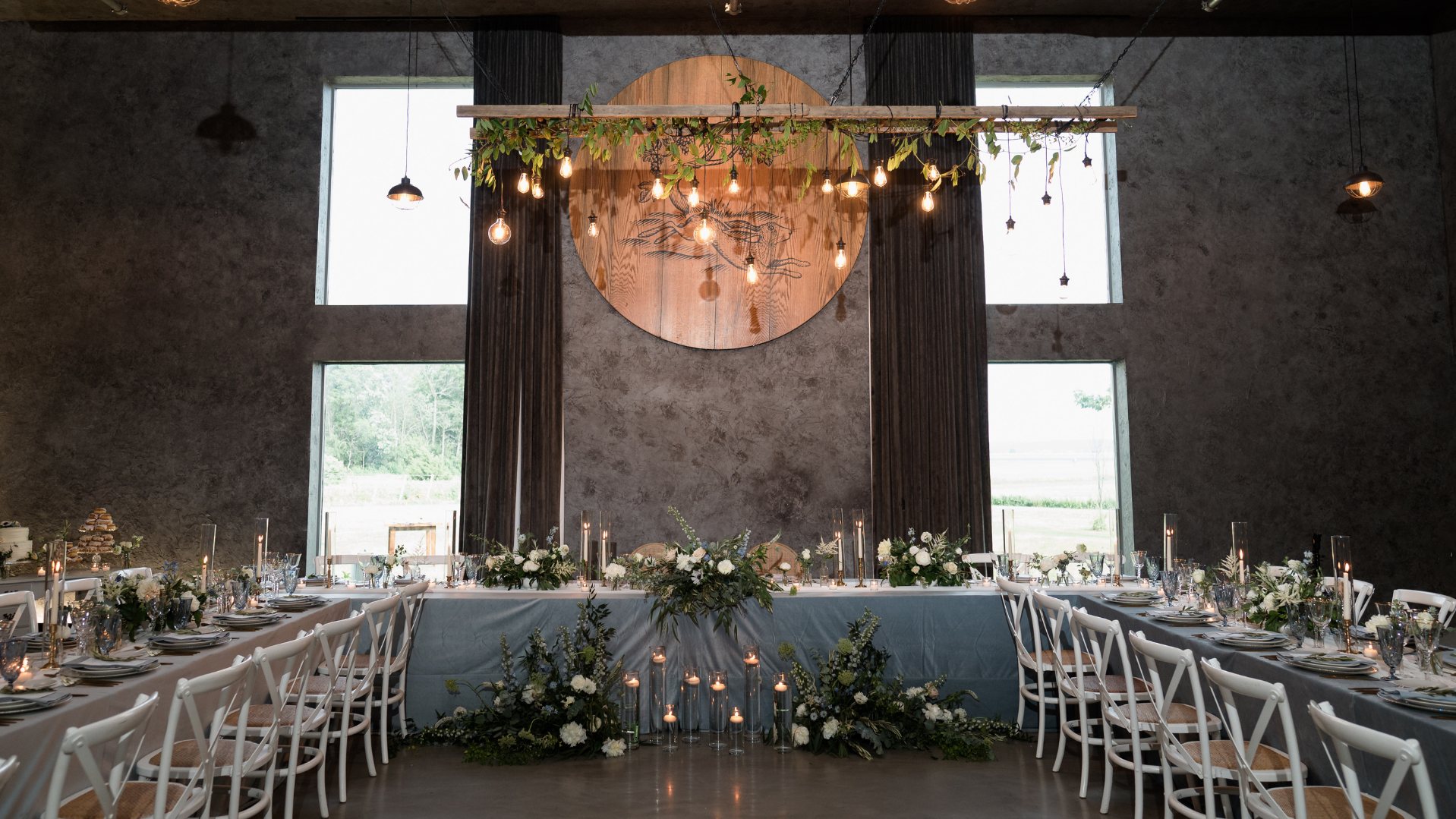Long tables set for a wedding reception at The Hare Wine Co