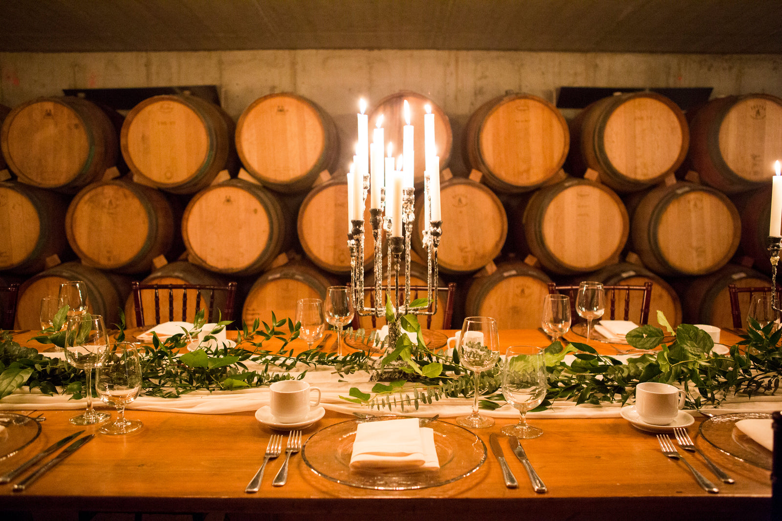 Candlelit wedding table in Ravine Vineyard Barrel Cellar