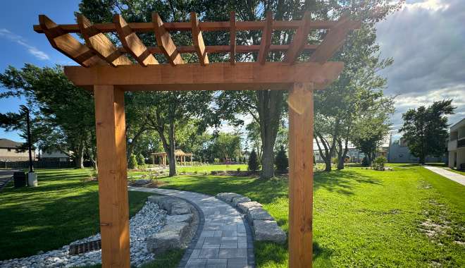 Wood pergola and garden path at Park 56 wedding ceremony space
