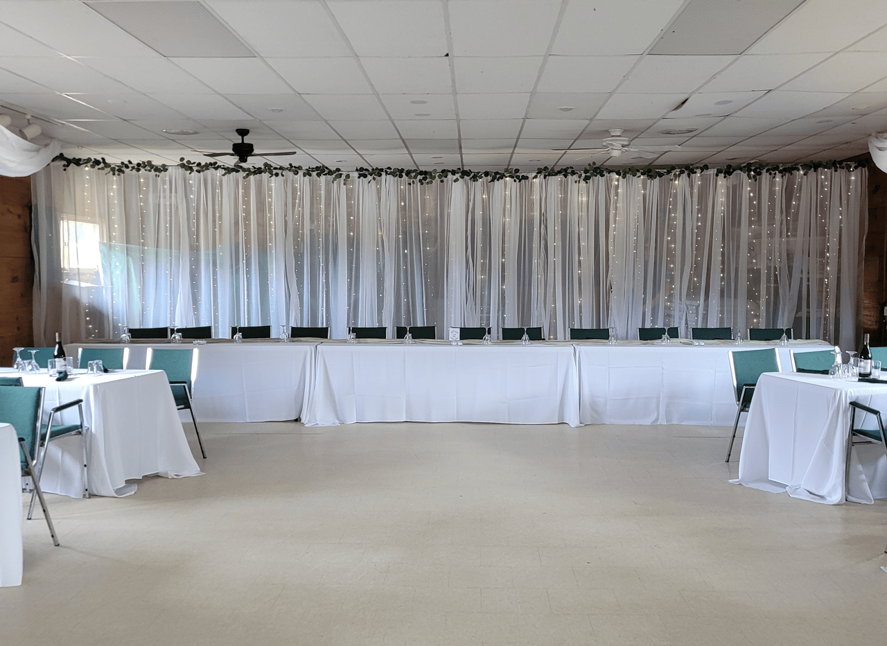 Bancroft wedding head table and reception backdrop
