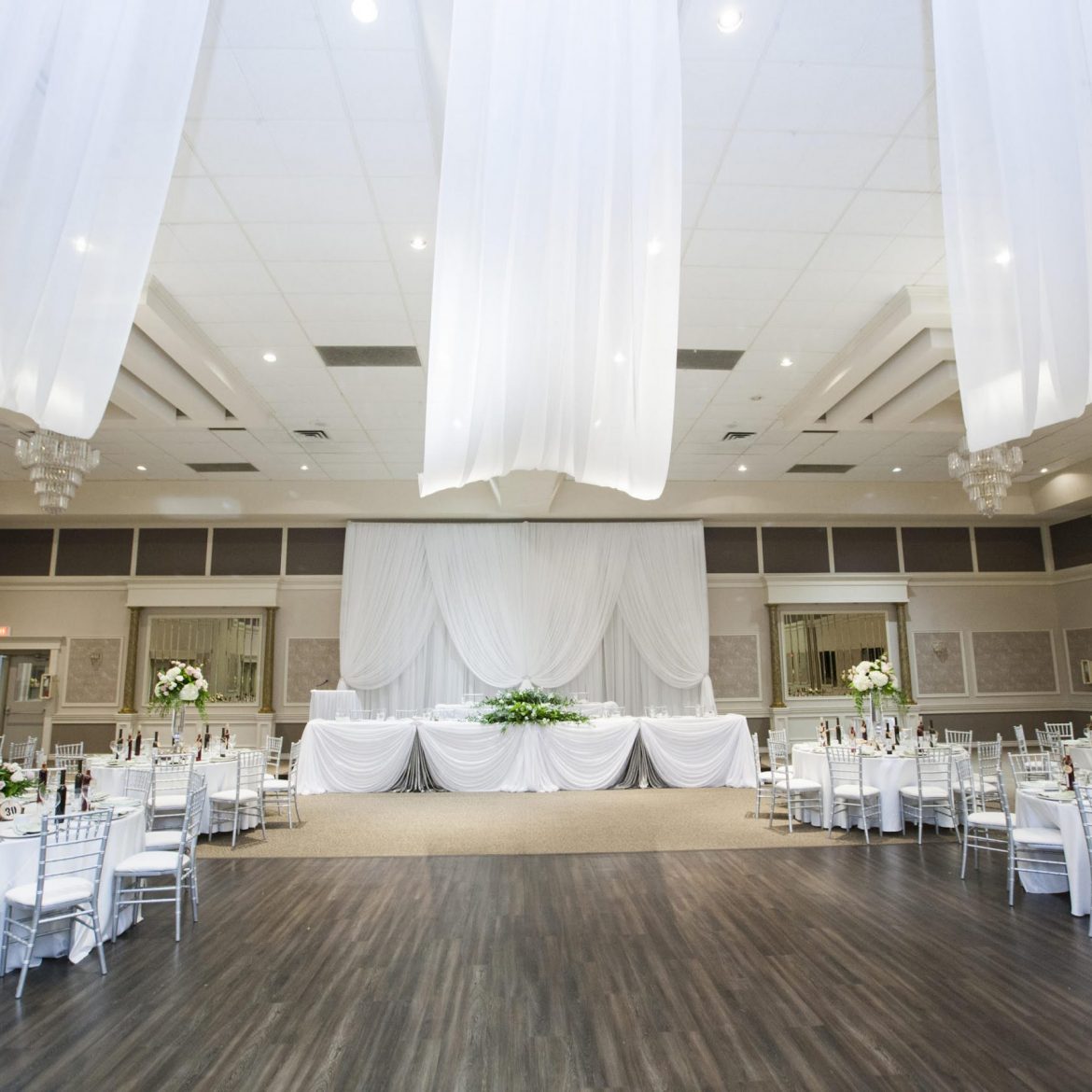 Bright wedding reception setup inside Club Italia Niagara Falls