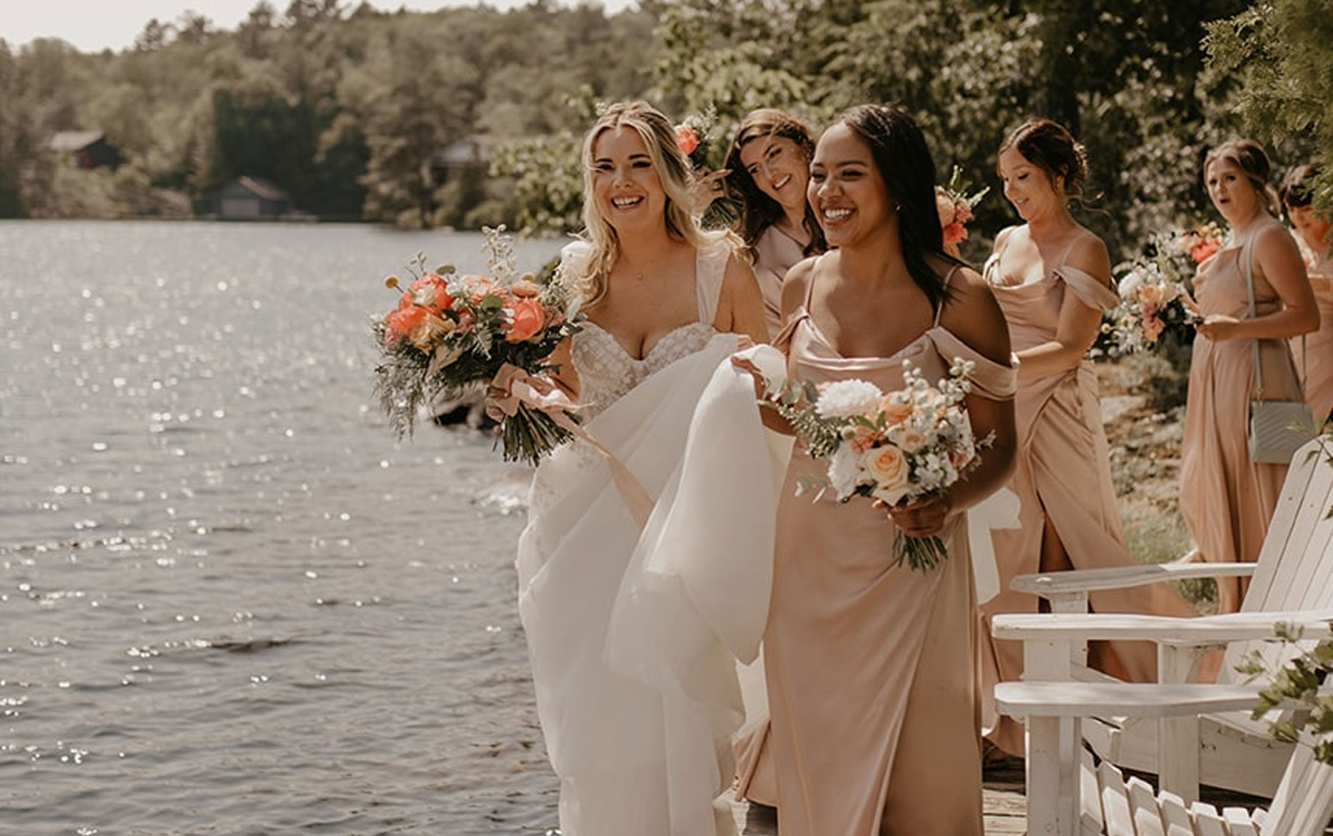 Wedding party by the water at Severn Lodge