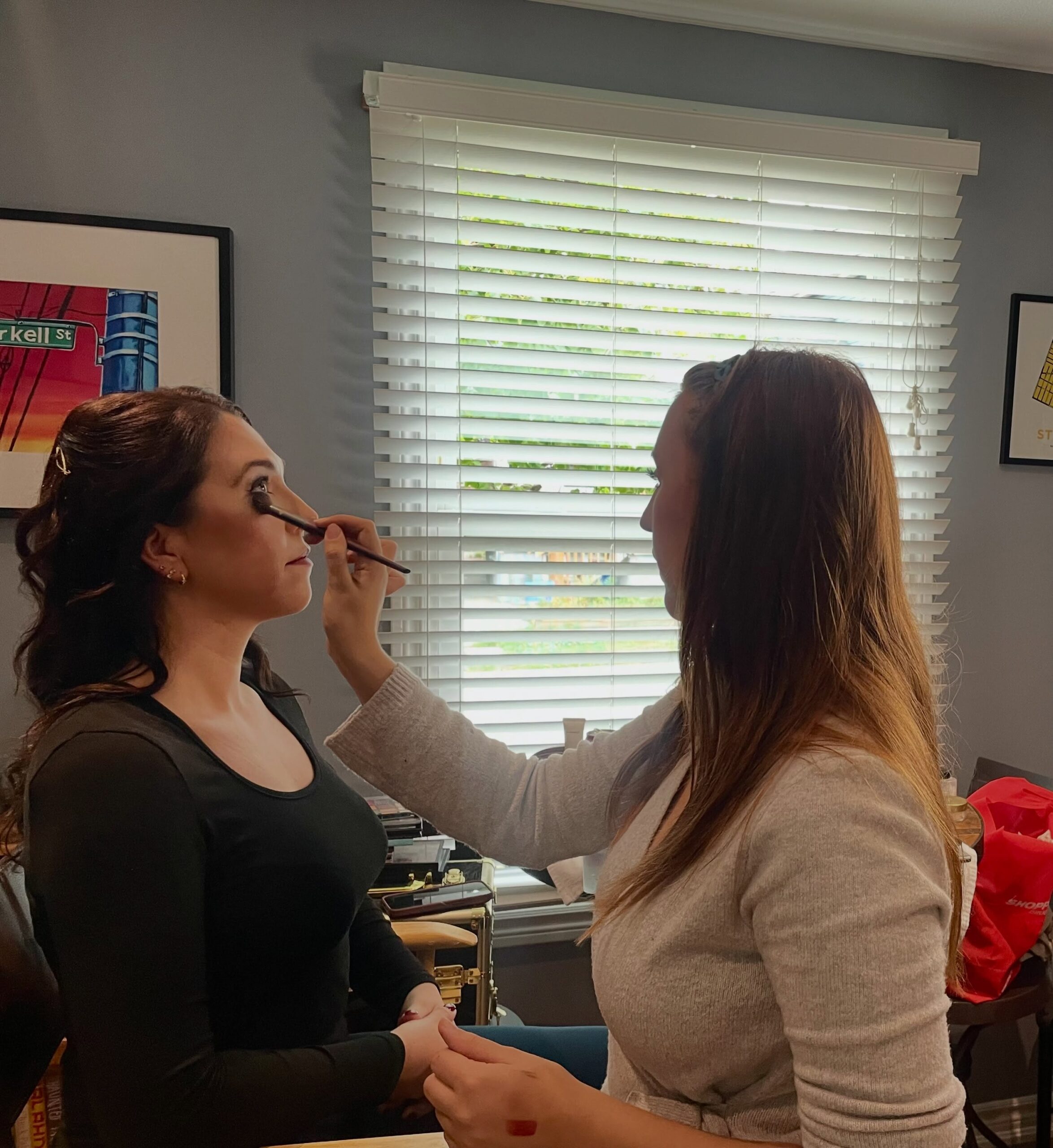 Taylor Birdsall applying soft glam eye makeup
